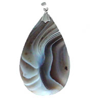 These pendants are beautifully hand-cut of natural Botswana agate, banded in striking colors of cream, brown, gray, black and white and suspended from a silver bail.  Made to be worn as a pendant on a silver chain, silk cord or ribbon.  In Stock  $6.00. Order NOW while supplies last!