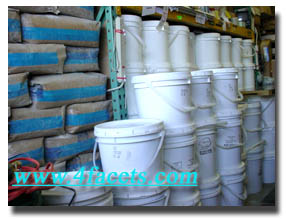 Rockhound Cutting Oil and Professional Lapidary supplies.  Photo shows Wesley's Trading Post own - WELL STOCKED Newport, warehouse showing just a portion of our large inventory of bulk abrasive grits or bulk polish for rock polishers, to lapidary cutting oil and supplies.  A northwest lapidary supplier stocking everything for the rockhound plus tools, supplies and equipment for lapidary, jewelry manufacturing and industrial applications. If you work on Jewelry, Stone, Glass, or Quartz, you need our products, In Stock and ships immediately.  To ensure availibility of your item, order as early as possible.  Click here to learn more about our abrasives and polish department!